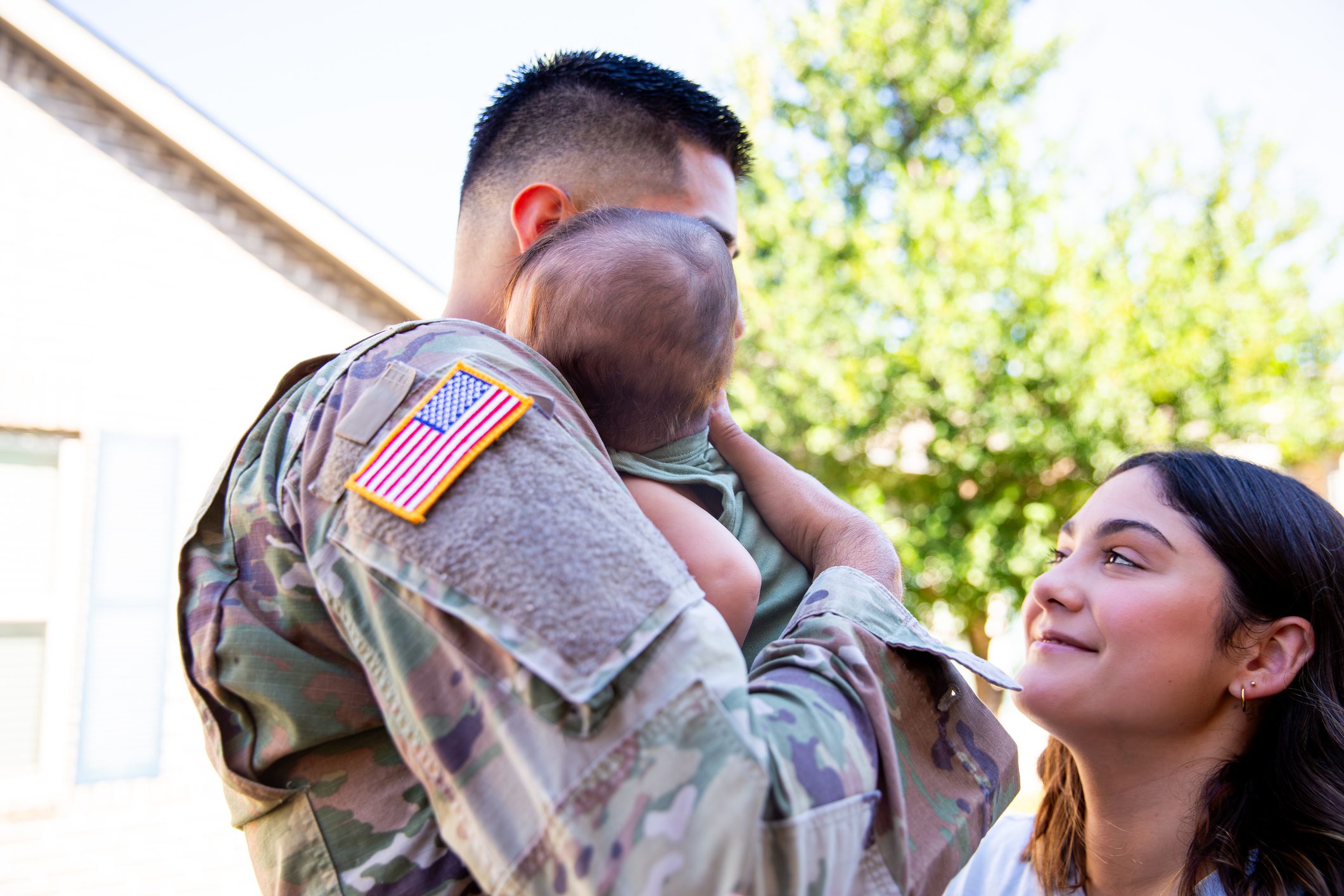 Father coming home to new baby from military service