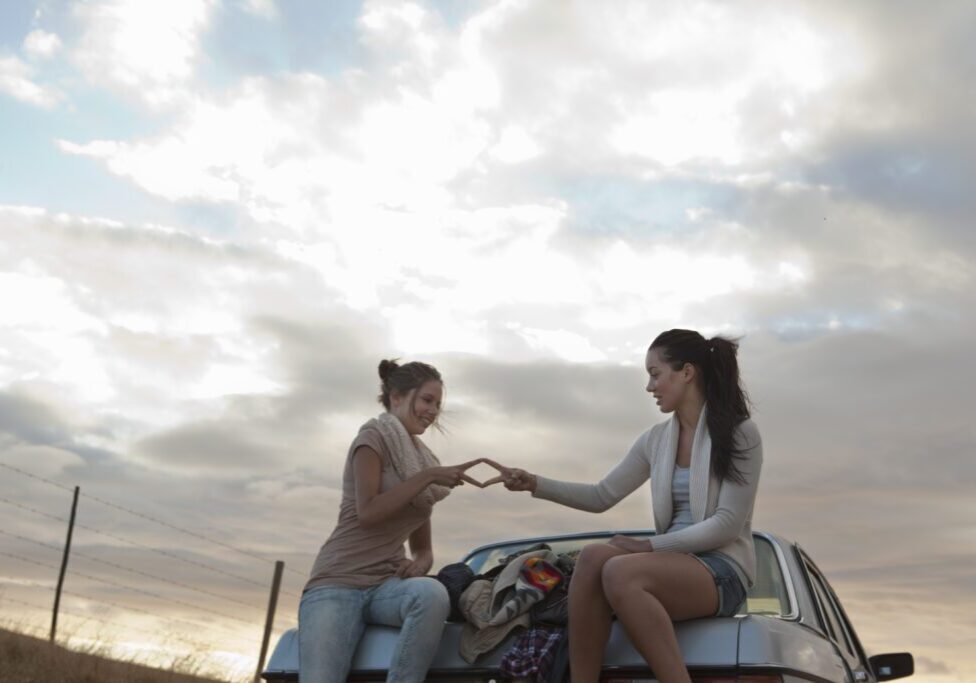 Scenic sky with friends on a road trip